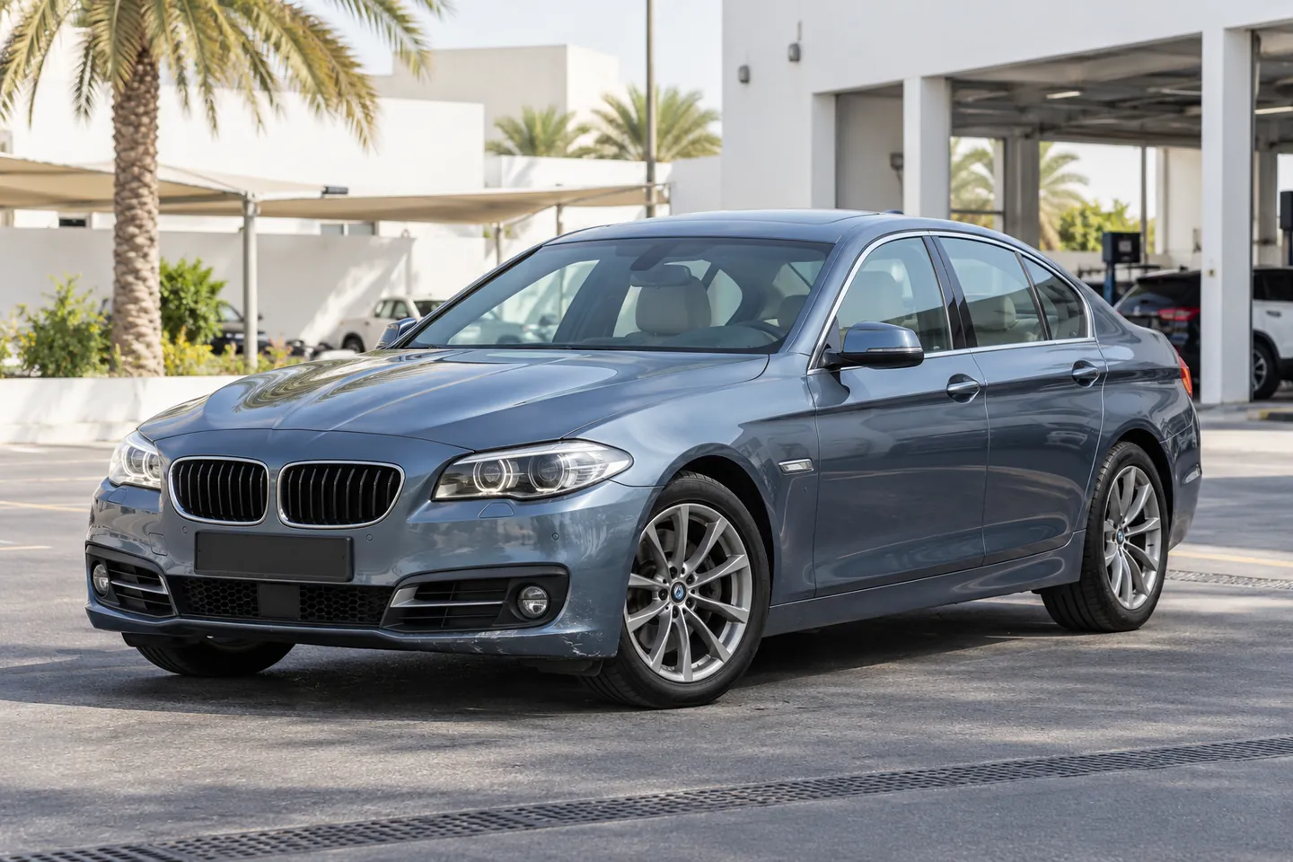 Older BMW-style sedan with modest wear, ready for an individual vehicle assessment